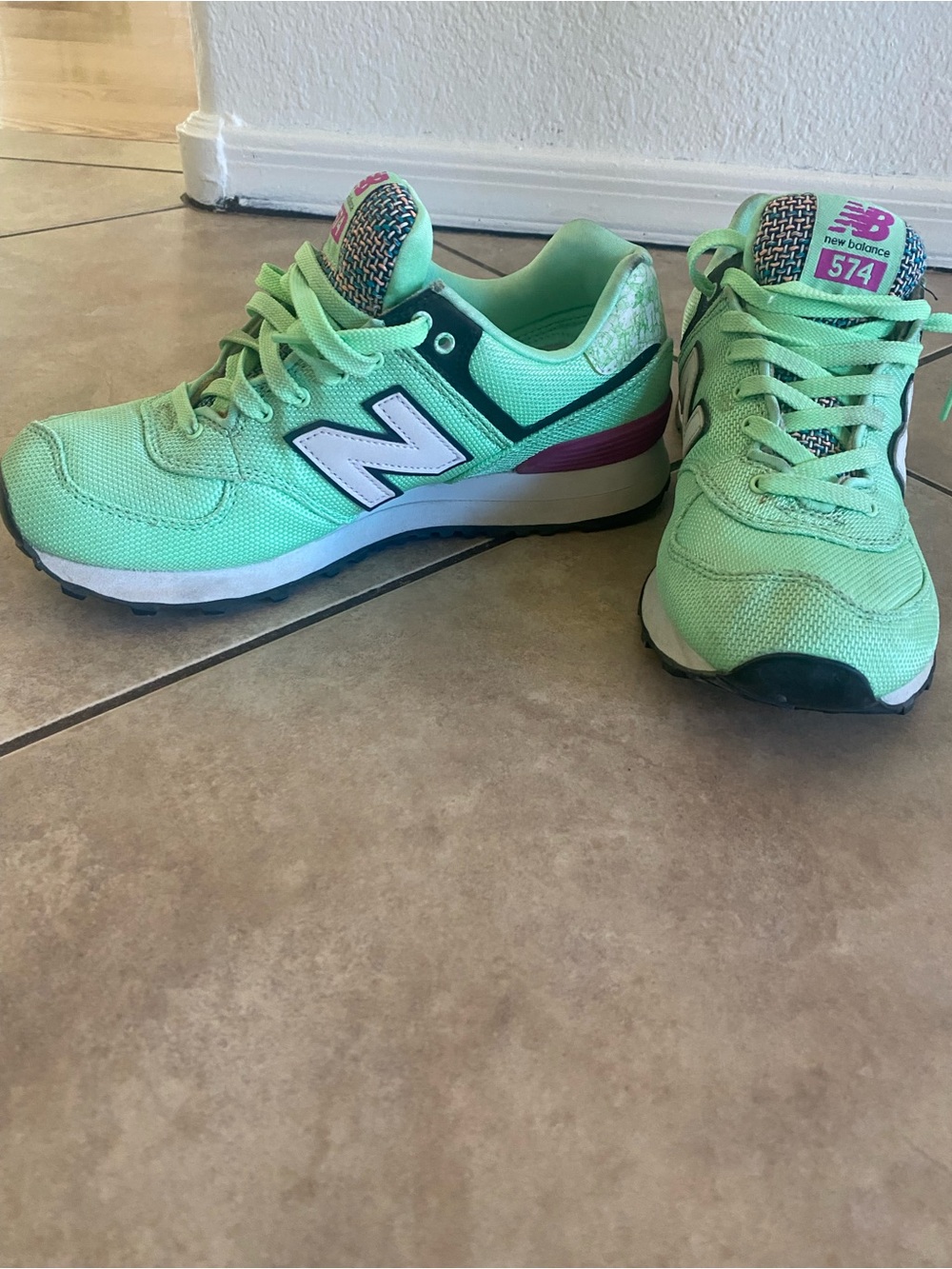 New Balance Women’s Mint Green 574 Sneakers with Purple Accent